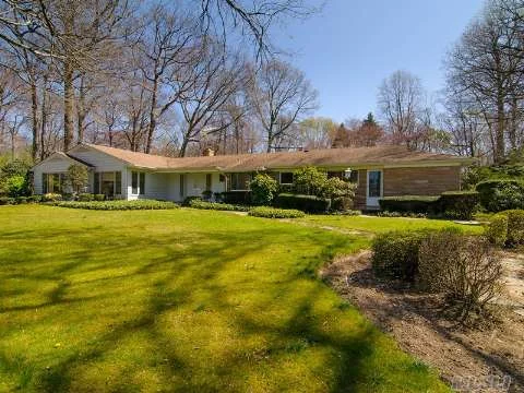 Impeccably Maintained Residence With Large Rooms Throughout Features Double-Sided Fireplace Between Living Room And Family Room And Large Kitchen With Breakfast Room. Gunite Pool. Residence Is Positioned Perfectly On Two Fabulous Flat Acres On Very Quiet Street Close To Water.