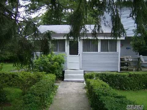 Take A Step Back In Time! Relax In The Enclosed, Heated Porch Of This 1 Bed Apt. Use Of Side Yard, Patio & Unfinished Basement. New Carpeting To Be Installed In The Bedroom!!!