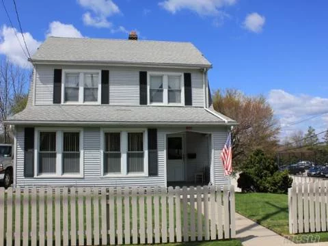 Beautiful Warm And Welcoming Colonial Home With Spacious Living Room & Formal Dining Room, Eat-In-Kitchen, Originally 4 Bedrooms ( Can Be Converted Back ), Master Bedroom Is The Size Of 2 Bedrooms. Walk-Up Attic. Hard Wood Floors Throughout. Central Alarm System