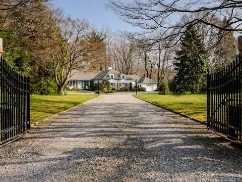 Spacious, Immaculate 5 Br Home With Fully Finished Lower Level Features Separate 1 Br Guest Suite With Own Entry And Garage. Perfect For The Extended Family And Set On 2 Glorious Maturely Landscaped Gated Acres At End Of Quiet Cul-De-Sac. Large Bluestone Terrace Leads To Pretty Koi Pond With Speciman Plantings And Wooden Foot Bridge