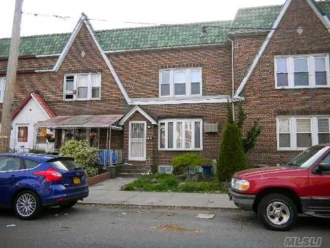 First Floor: Living Room, Eat In Kitchen, Formal Dining Room, Full Bath. Second Floor: Large 2 Bedroom And A Small Bedroom And Full Bath. Skylight Window In Second Floor. Fully Finished Basement Has Laundry Room, Half Bath, Open Space For Family Entertainment. Backyard, Private Parking Space, 1 Car Garage.