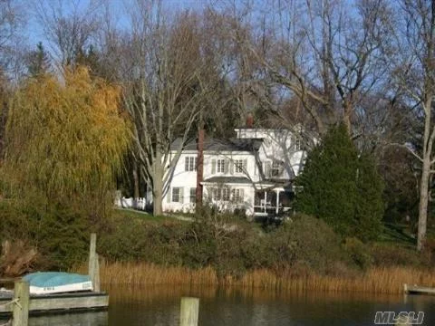 Motivated Sellers. Move In For Summer 2012. Waterfront Antique Farmhouse W/ 5 Br&rsquo;s & 4.5 Baths. Recently Renovated Yet Retains Its Soul. Wraparound Screened Porch, Sunroom, Dock W/ Power, Water & Lights, 5&rsquo; At Low Tide. Facing South & Open To Southold Bay. Includes Workshop/Pottery Studio.