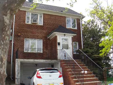 Excellent Semi-Detached Legal Two Family Home, Tenant Occupied, Can Be Delivered Vacant If Necessary, Upgraded Windows, Ease Commute To Nyc, (Less Than 10 Miles), Near Queens College, Cuny Law School, Townsend Harris High School, Paul Klapper School, Botanical Gardens, Buses Q20 & Q44. Walk-In Unfinished Basement With Lots Of Potential. Perfect For Professional Office.