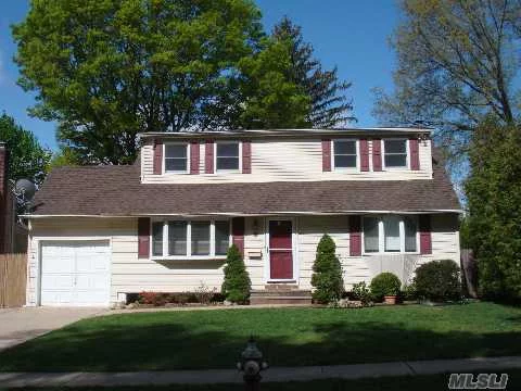 Totally Renovated 4Br Colonial With Wood Flooring/Cabinets, Granite Counter Tops On A Beautiful Piece Of Property In N. Syosset Within Walking Distance To The Train Station.