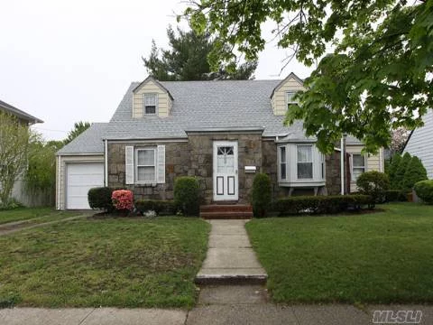 Charming And Bright Extended Cape. The First Floor Features A Nice Sized Living Room With Fireplace, 2 Bedrooms, Full Bath, Eat-In Kitchen, Large Dining Room, 14 X 20 Den With Sliding Door To The Patio. The Second Floor Has 2 Bedrooms, Full Bath, Sitting Area And Lots Of Closets. There Is A Full Unfinished Basement. Mid Block Location. The Roof Is 2 Yrs Old.