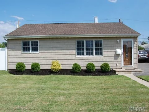 Home Has Been Completely Redone Down To Studs. New Kitchen W/ Granite Counters, Bath, Windows, Siding, Roof, Insulation, Electric, Plumbing, Walls, Flrs, Doors, Stainless Appls, Central Air, Driveway, Paver Stoop, Patio, Pvc Fence Etc. Fire & Security, And Home Theatre Systems Wired In Wall. Surround Sound Thru Out Home. Taxes W/O Star. Award Winning Plainedge Schools #18.