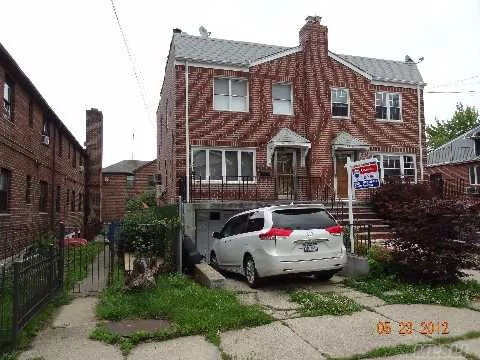 Large All Brick 1 Family Colonial. Well Maintain. Very High Basement, Nearly 3 Story Above Ground!