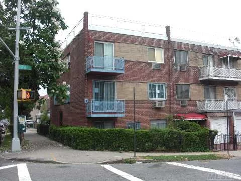 Nice 2 Family Brock With Medical Office Use First Floor. 'C Of O' For 3 Units, 13 Rooms, 4 Wall Air Conditioners, Many Closets, 2 Sky Lights, New Heating Unit, 3 Zone Heat, New Roof, 2 Balconies And Car Port.  Corner Property. A Must See!!!