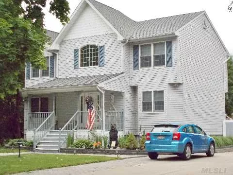 Updated 4 Bedroom Colonial In Old Medford On Shy Acre. Great House For Entertaining. Finished Basement, Deck, Det Garage W/ Bar Set-Up, Energy Efficient Hybrid Gas Heat, Cac, Huge Yard With Limitless Possibilities, Granny Porch, Wide Driveway, Pavers. Taxes W/ Star $9501.97