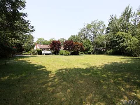 Beautiful Ranch On The Nassau/Suffolk Border Flat Acre, Entry Foyer, Living Room, Formal Dining Room, Eat In Kitchen, Den With Fireplace, 4 Bedrooms, 2.5 Baths, Laundry. Half Hollow Hills Schools --Not A Main Road...Beautiful Secluded Neighborhood On Nassau/Suffolk Border. Very Quiet.