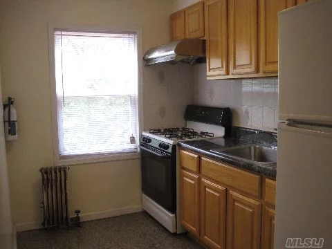 Renovated 1 Bedroom Apt. Huge Closet-Granite Floor In Kitchen- Close To All. Includes Heat And Water. Close To Lie And Clearview Exprwys. Express Bus To City On Corner. New Appliances And Sparkling Bathroom Renovation. Apt Includes Carpet.