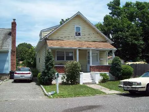 Great Opportunity To Live In East Northport. Low Taxes House Being Sold As Is.Taxes Do Not Reflect Star Of 845.00
