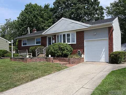 Beautiful 3 Bedroom Ranch On And Oversized Property. The Beauty Of Massapequa Park Without The Village Tax. New Roof And Siding, Updated Kitchen, Newly Finished Basement, Re-Finished Hard Wood Floors, New Windows In Bedrooms, Updated Bath, 200 Amp Service.