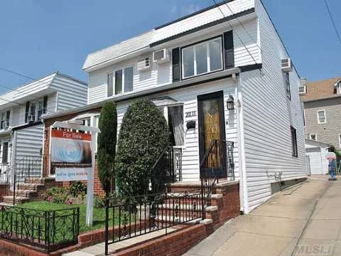 Semi-Det Colonial In Prime Bayside Location, Features Living Rm, Formal Dining Rm, Extended Eat-In Kitchen, 1.5 Bathrooms, 3 Spacious Bedrooms, Private Balcony On The 2nd Fl, Finished Basement, 1.5 Car Garage, New Siding, Updated Windows, Near Schools, Shops, House Of Worship, & Transportation. Ps 159, Is 25.