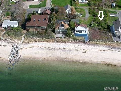 Beautiful Soundfront Beachfront Lot. New Bulkhead. No Bluff For Easy Beach Access! Build Your Dream Home Now!