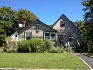 Located In The Heart Of West Islip, Large Level Lot With Detached Two Car Garage And Plenty Of Parking