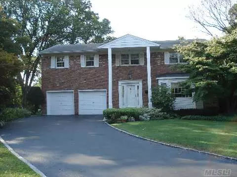 Ch Colonial, Cul-De-Sac Location, Gracious Entry Foyer, Fdr W/Wainscotting, Updated Eik, Fam Rm W/Fpl, Master Suite W/Bath, 3 Beds, 1 Bath, Large Flat Property. Fine Moldings, Alarm, Sprinklers, 2 Car Garage.