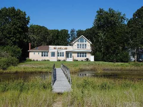 Bayfront Contemporary Beach House Totally Renovated In 2009 With 100 Plus Feet Of Sandy Bay Beachfront. Custom Kit./W/Cherry Cabinets And Granite Counters, Open Liv.Rm/Din.Rm./Den/All With Views Of The Bay. 2 Br, 1.5 Baths. .Upstairs Is The Master Bedroom And Bath, Opening Onto A Custom Ipe Wood Deck With Views To Bay.Perfect For Outdoor Dining Or Just Star Gazing.