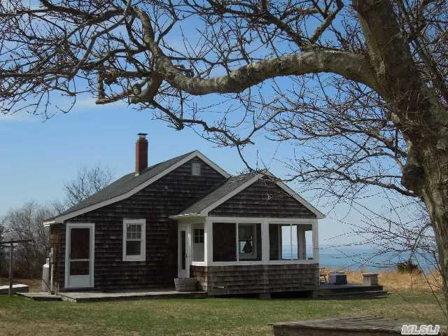 Step Back In Time Here, Leave The World Behind. Beautiful Unspoiled Soundfront Cottage. Secluded And Private. New Bulkhead.Sandy Beachfront To Pass The Lazy Days Of Summer!!!