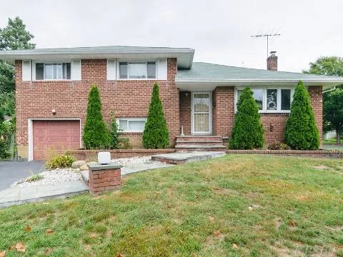 Drastic Price Reduction!!!!All Brick Split Level In Syosset, Large Property, Syosset Schools.Entry Leads To A Large Lr, And Formal Dy Eik Is Newly Updated, Large Family Rm With A Bar, Sliding Doors To Closed Patio Or Florida Rm, Large Bsmnt Fin W/Tile Flrs And Cedar Closet, Upstairs Large Hallway Fbth, Br, Br, Mbr W/Fbth, Won&rsquo;t Last, Must See!!!!