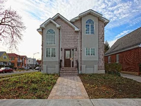 Front : Triplex Style Luxurios Brand New 2Family, Beautiful Custom Built Home. Side : 2Br, 2Bth , Kit