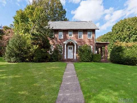 Stately Solid Brick Colonial Sited On A Lovely Deep Property. Wonderful Original Details Including Hardwood Floors, High Ceilings And Beautiful Moldings Make This One Of Sea Cliff&rsquo;s Treasures.
