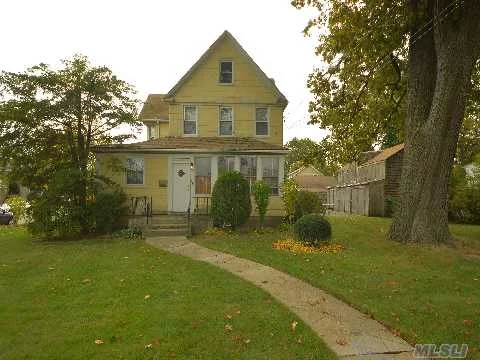 4 Bedroooms, 2 Baths, Just Reduced. Hardwood Floors, Finished Basement W/Access To Yard, Enc. Front Porch..Come & See!