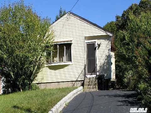 Charming Four Bedroom Ranch Offering An Eat In Kitchen With Bamboo Floors, Great Room (Dining Rm/Lr Combo) With Fireplace, Cathedral Ceilings, Ful Basement With Inside Entrance- Secluded Residential Neighborhood Close To Shopping, College, & A Block Away From The Park.