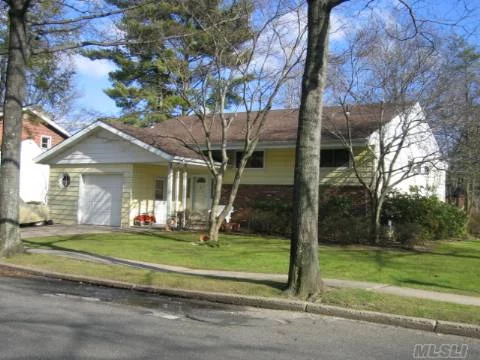 Desireable Open Flow Hi-Ranch Model With Expansive Cathedral Ceilings, New Kitchen And Expanded Laundry Area. 8 Ft. Sliders Lead To Large New Deck On 87 X 100 Ft. Property. 4 Bedrooms, 3 Baths, New Master Bedroom Bath. New Windows, New Roof, New Furnace, New A/C Compressor. Hardwood Floors Throughout. Beautiful Stone Driveway.