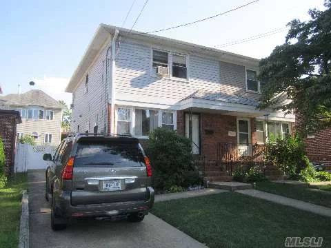 Location, Location, Location. This Move In Ready Semi-Detached Home Is Within Walking Distance To Lirr And 2 Blocks From Crocheron Park. Only Semi-Detached On Street Makes This A Unique Opportunity To Afford A Piece Of This Prime Bayside Real Estate At A Much Lower Price. Updated Kitchen W/Ss Appliances.Additional Windows Installed Makes This Home Light And Bright.