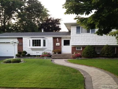 This Is A Truly Beautiful Home. New Roof, Siding, Windows Including A Livingroom Bay, Paving Stone Walk, Ceramic Baths, Sliding French Doors To A 20X20 Patio. Decorator Paint, Gleaming Polished Hardwood Floors, Vaulted Ceilings, Plus Vinyl Fencing Make This Home A True Beauty. Model Lends Well To Convert To A Legal Accessory Apt., If Needed. A Real Delight To See!