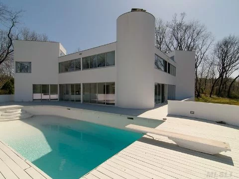 Striking Cedar And Glass Residence Offers Dramatic Angles And Curves, Soaring Walls Of Glass, And Richly Stained Hardwood Floors As Well As Exception Unobstructed Waterviews Of Long Island Sound From Nearly Every Spacious Room. It Is Surrounded By Verdant Lawns, Woodlands, And Preserve.