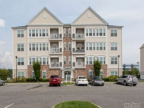 2 Bedroom Condo For Sale In Central Islip, Ny (Courthouse Commons). Largest Model In Community On The 4th Floor Of An Elevator Building. Features Inc. An Oversized Garage, S/S Appliances, Granite, 2 Full Baths & Terrace. Amenities Inc. Gym, Tennis, Swimming & Gardening.