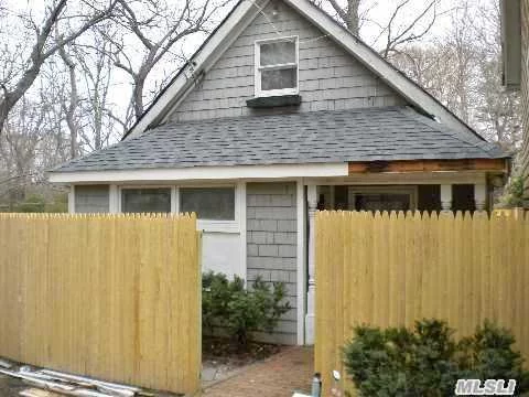 Adorable Carriage House. Fenced Private Yard. 1 Bedroom, Livingroom, Dining Area, Full Bath.
