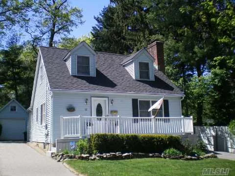 Fall In Love With This Captivating Cape Full Of Charm And Warmth That Boasts An Open Floor Plan And Hardwood Floors. Enjoy Special Moments By The Wood Burning Fireplace Or Entertain Outdoors In The Private Yard With Mature Plantings. The Full Basement Is Partially Finished With Separate Rooms. 2 Driveways With A 1 Car Garage Complete This Offering.