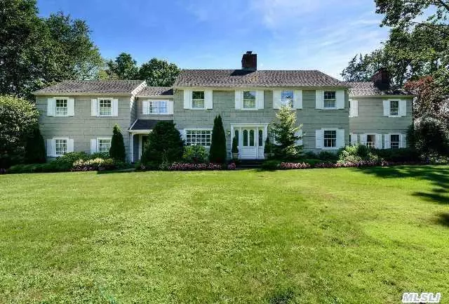 Set On A Magnificent Lush Acre In One Of The Most Treasured Streets In Manhasset, This Pristine Colonial Boasts The Finest Quality Detailing And Craftsmanship, Exuding Casual Elegance Throughout. The Grand Interior Space Flows Seamlessly To The Outdoor Entertaining Spaces Which Include A 20 X 50 Ft. Pool And Cabana And Summer Kitchen. The Natural Gas Generator Is A Bonus!