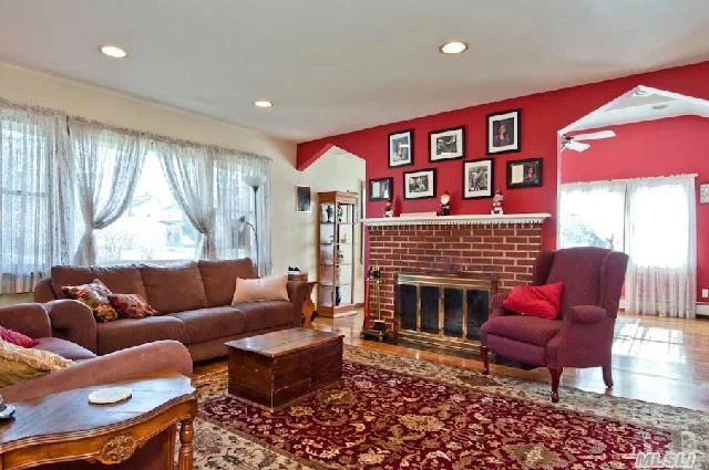 Open Floor Plan. Formal Living Room With Wood Burning Fireplace And Gleaming Wood Floors. Formal Dr With Exposed Brick Wall Leads To Over-Sized Eik W/Cherry Cab, Gas Cooking And New Granite Counters.Cac Updated Windows. New Master Bthrm. Finished Lower Level Offers Room For Extended Family. Conv To All