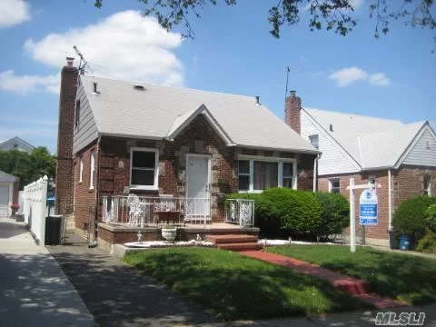 Newly Renovated 3 Bedroom 2 Bath Cape On A Quite Tree-Lined Street. New Windows, 2 Modern Bathrooms. Separate Entrance To Basement. Walk To Bus Stops, Park, And Schools. School District #26: P.S. 162, J.H.216 And Francis Lewis H.S.