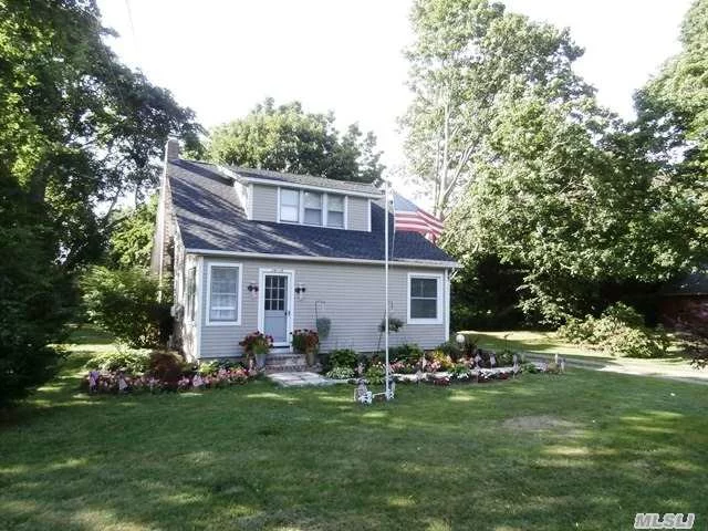 Charming Country Cape Conveniently Located Close To Downtown Cutchogue. 2 Bedroom, 1.5 Bath Main House Plus A 1 Bedroom, 1 Bath Cottage All On 1/2 Acre Lot. Vinyl Siding, New Roof, Updated Kitchen, Bath And Much More.