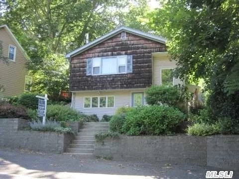 Oyster Bay This Hi-Ranch Offers A Family Room, Hard Wood Floors, A Wood Burning Fireplace And An Accessory Apartment For Mom With Proper Permit. Deceiving From Outside, Must See Inside.