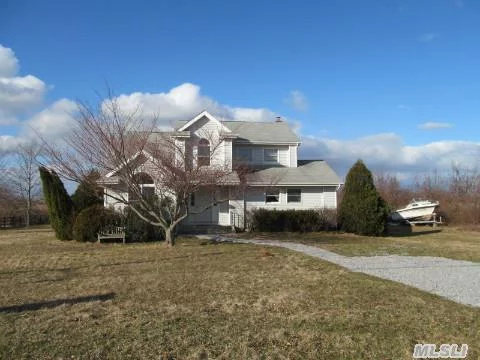 This 2300 Sqft Home Sits On Nearly An Acre In Jamesport. Large Eik, Family Room, Dining Room, Main Floor Bedroom Or Excellent For An Office. 3/4 Bedrooms With Ample Closets And 3 Full Baths!