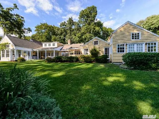 Striking Home Offering Magazine Featured Rooms. Totally Restored At The Highest Level. Charming And Elegant. Multiple French Doors Lead To Patios And Porches Overlooking Stunning Grounds. Pool. Beach Rights.