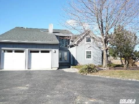Beautiful 4000 Sq Foot 4 Bedroom 3 Full Bath Colonial On Canal In Idle Hour. Quiet & Serene Location With 60&rsquo; Your Own Docking To Boat Or Canoe. Updated Kitchen & Baths, Radiant Heat, 2 Story River Stone Fireplace, Spacious Open Floor Plan. Taxes With Basic Star: $18856.33 Are Succesfully Being Grieved.High & Dry From Sandy, Flood Insurance Only$400 A Year And Transferable!