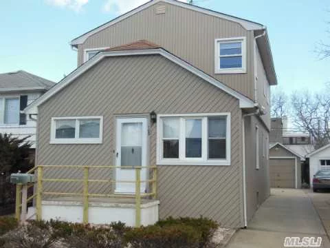 Ideal Legal 2 Family!  1 Bedroom Over 2 Bedroom -- New Gas Heat & 2 Separate Meters,  Vinyl Siding,  Detached Garage Priced To Sell. Dont Wait To Own And Rent.