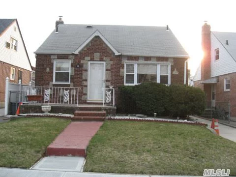 Newly Renovated 3 Bedroom 2 Bath Cape On A Quite Tree-Lined Street. New Windows, 2 Modern Bathrooms. Walk To Bus Stops, Park, And Schools. School District #26: P.S. 162, J.H.216 And Francis Lewis H.S