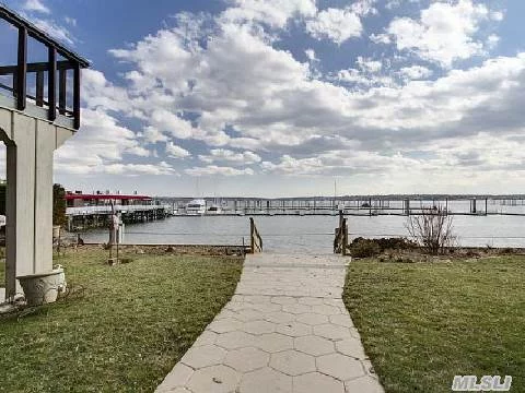 Ahoy! Spectacular Views Of Manhasset Bay! Boasting 2 Balconies And A Patio All Facing The Water. Incredibly Spacious Town Home With Open Floor Plan. 3 Bedrooms, 2.5 Baths, Living Room With Fireplace, Dining Room, Den, Eat-In Kitchen, Storage, Garage And Driveway.