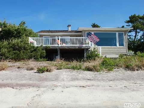 Now Is Your Chance To Experience Waterfront Living On Fire Island Inlet In This Emaculate, Sunfilled Home W/Cozy Living Room W/Fireplace. Relax On The White Sandy Beach In A Very Private Setting.Master Bd Opens Up To Spacious Deck W/ Increditble Water Views. Just 50 Min To Nyc. Come Live At The Beach!