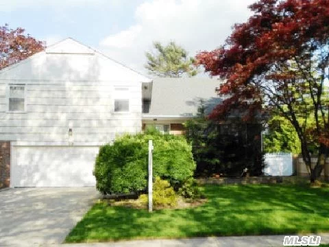 Spacious 4 Bedrooms, 3.5 Bath Split On Quiet Street With Beautiful Waterview. Updated Granite Eik. 4th Level Master Suite Has Green House Retractable Ceiling Cover. Hewlett-Woodmere School. Taxes Do Not Reflect Star Exemption.