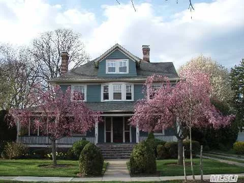 This Gorgeous Historically Restored Victorian Center Hall Colonial Boasts 7 Bedrooms And 2.5 Baths, 4 Fireplaces, Hardwood Floors, Restored French Doors, Wrap Around Screened Porch On A Beautiful Block. A True Unique Rare One Of A Kind. This Home Has Been Featured Several Times On The Freeport Historical House Tour.