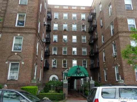 Large 1 Bedroom On Top Floor Of Forest Hills Most Classic Historic Pre-War.. Huge Rooms..Hard Wood Floors, Eat In Kitchen..Dining Foyer Custom Bath..Giant Livingroom..Huge Bedroom..Great View...Eastern Exposure..Laundry..Bike Rack..Storage..On Site Super..Around Corner From Express Subway..Seconds To Austin Street Shopping And Lirr